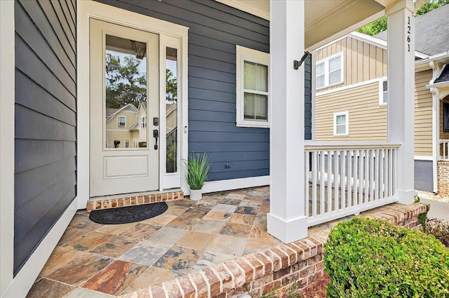 1261 Myrtle View Dr, Tallahassee, FL 32312 - view of exterior entry featuring covered porch