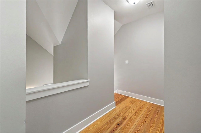 1261 Myrtle View Dr, Tallahassee, FL 32312 - corridor with baseboards, visible vents, and wood finished floors