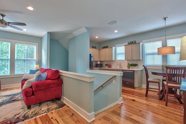 1261 Myrtle View Dr, Tallahassee, FL 32312 - kitchen with a ceiling fan, light countertops, baseboards, recessed lighting, and light wood-style flooring