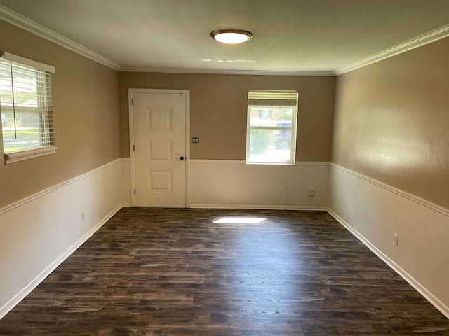 320 Lancaster Dr, Tallahassee, FL 32304 - spare room featuring plenty of natural light, ornamental molding, dark wood finished floors, and baseboards
