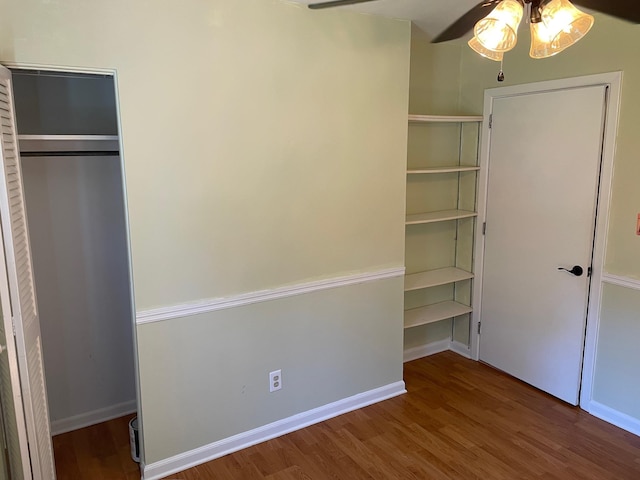 320 Lancaster Dr, Tallahassee, FL 32304 - unfurnished bedroom featuring wood finished floors, a ceiling fan, and a closet