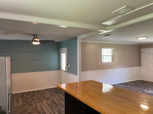 320 Lancaster Dr, Tallahassee, FL 32304 - kitchen featuring stainless steel fridge, wooden counters, ornamental molding, visible vents, and dark wood-type flooring