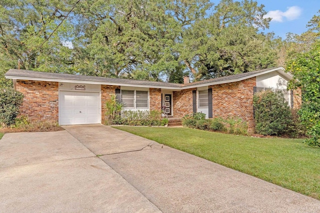 ranch-style home featuring a front yard and a garage