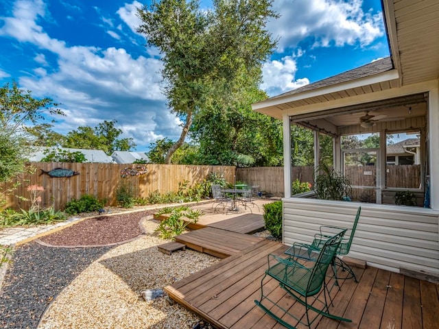 wooden deck with ceiling fan