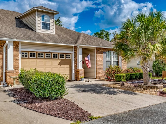 view of front of property featuring a garage