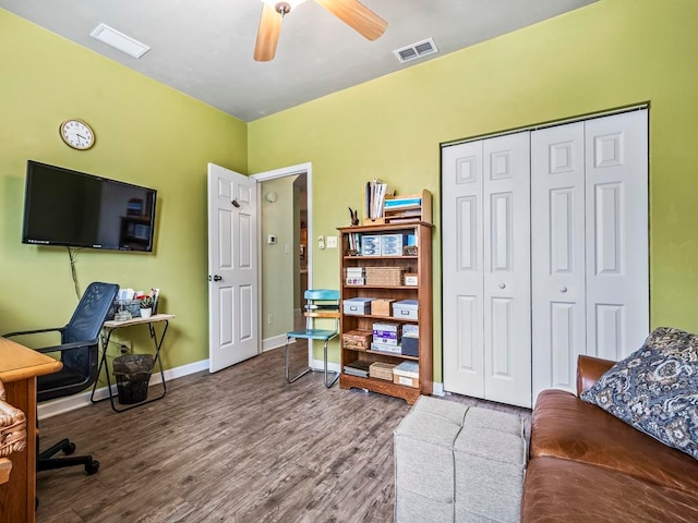 office featuring hardwood / wood-style floors and ceiling fan