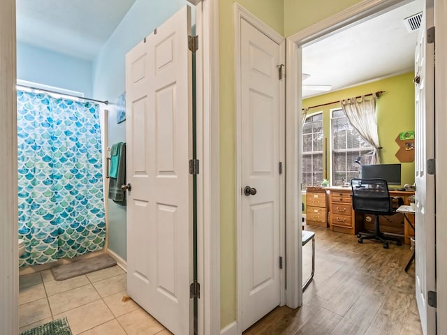 hallway featuring light hardwood / wood-style floors