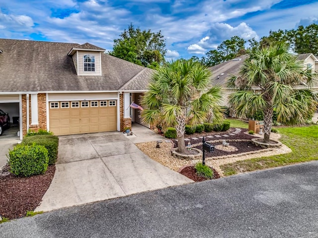 view of front of property with a garage