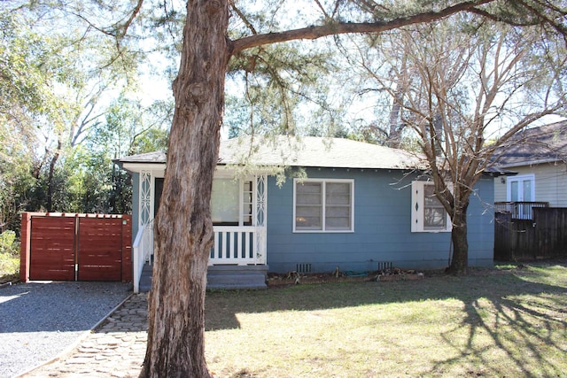 view of front of property with a front lawn