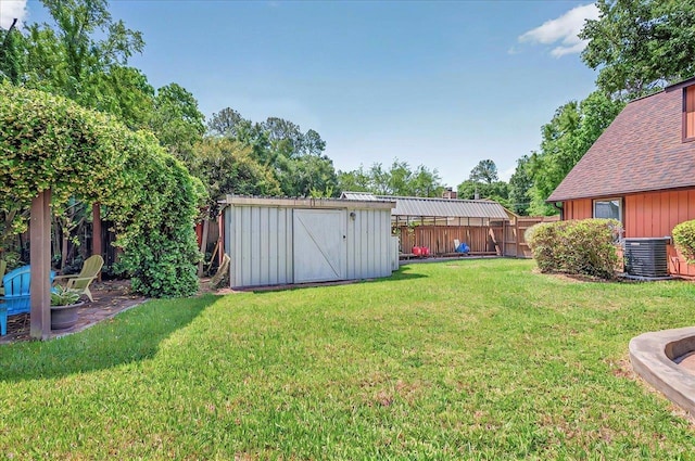 6847 Donerail Trl, Tallahassee, FL 32309 - view of yard featuring a storage shed, cooling unit, and an outdoor structure