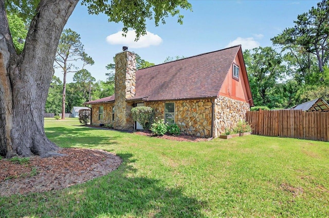 6847 Donerail Trl, Tallahassee, FL 32309 - view of property exterior featuring stone siding and a chimney