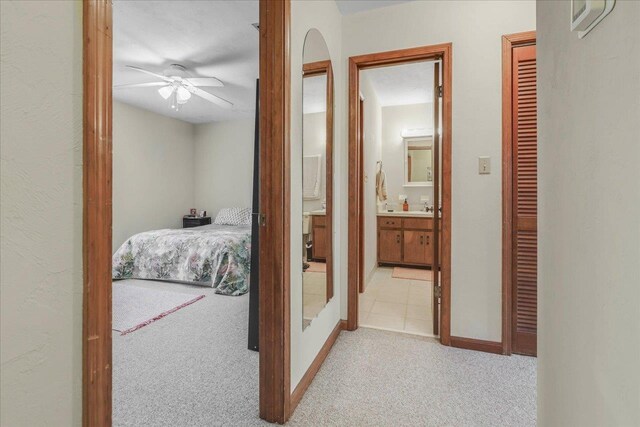 1334 Jackson St, Tallahassee, FL 32303 - hallway featuring baseboards and carpet