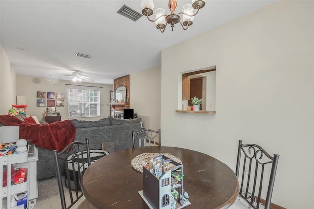 1334 Jackson St, Tallahassee, FL 32303 - dining room featuring visible vents and ceiling fan with notable chandelier