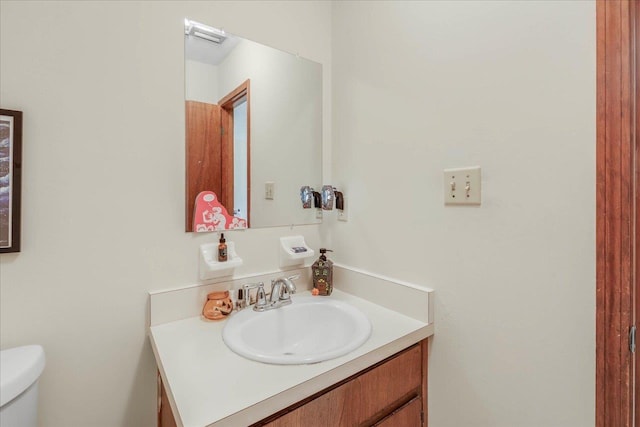 1334 Jackson St, Tallahassee, FL 32303 - half bathroom featuring vanity and toilet
