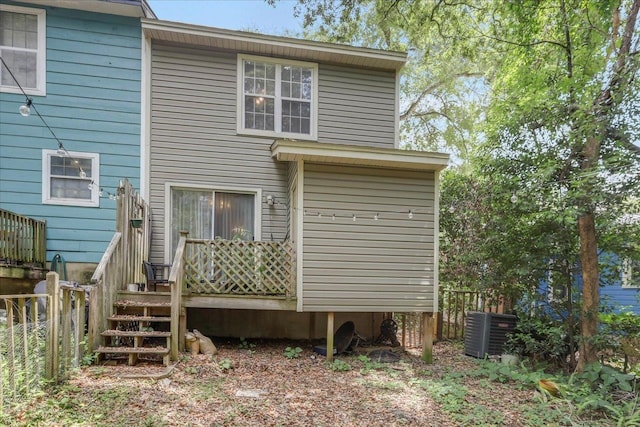 1334 Jackson St, Tallahassee, FL 32303 - back of house with a deck, fence, and central AC unit