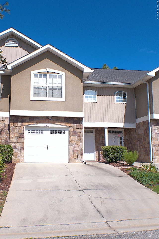 view of front of property with a garage