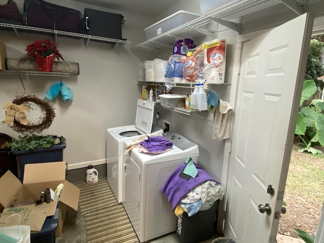 laundry room featuring laundry area and washing machine and dryer