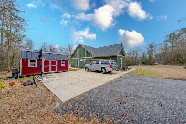 exterior space with a shed