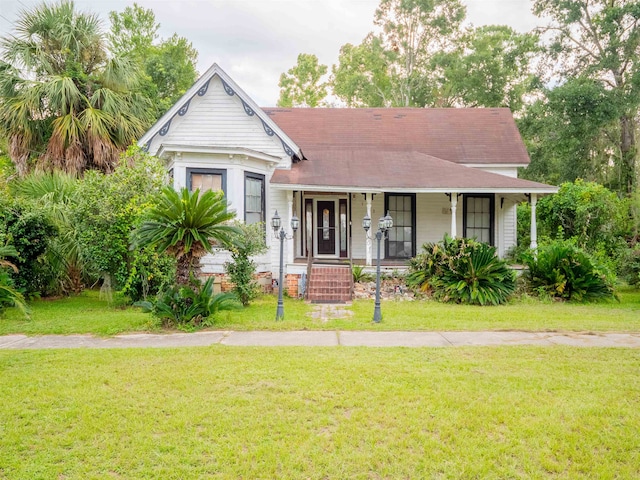 view of front of house featuring a front lawn and a porch