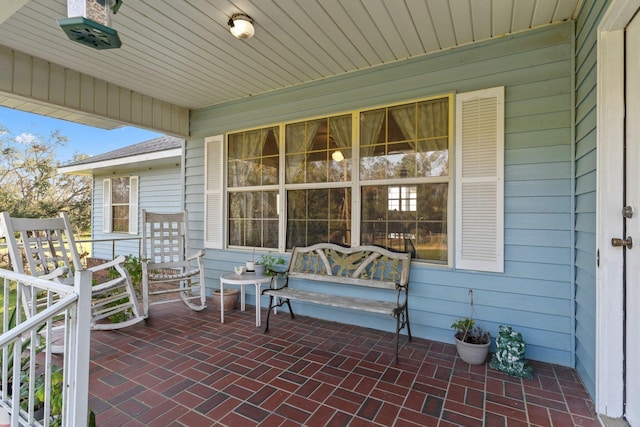 view of patio featuring a porch