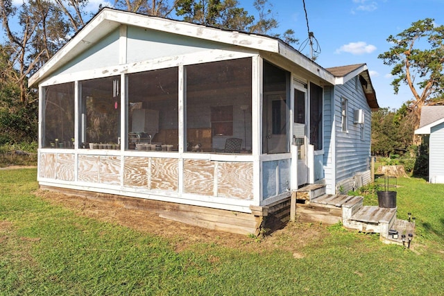 view of home's exterior featuring a lawn