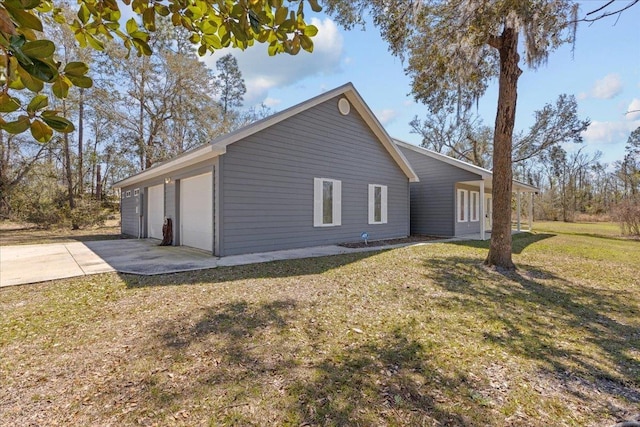 view of property exterior with a yard