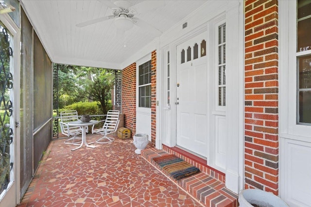 921 Forest Dr, Quincy, FL 32351 - doorway to property with covered porch, brick siding, and a ceiling fan
