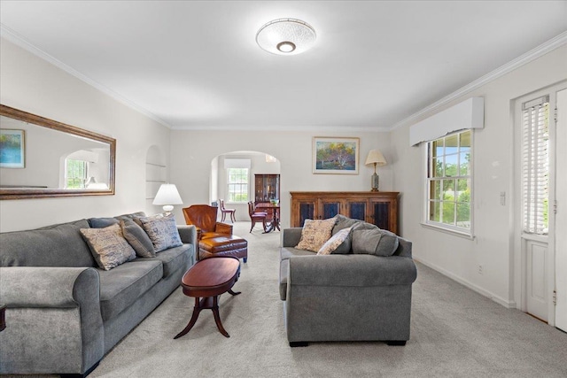 921 Forest Dr, Quincy, FL 32351 - carpeted living area featuring arched walkways, plenty of natural light, ornamental molding, and built in features