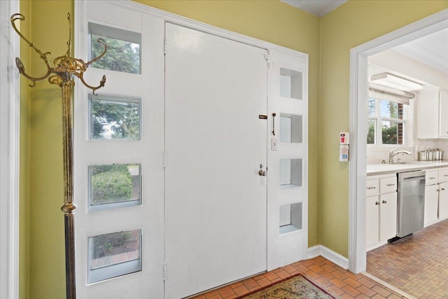 921 Forest Dr, Quincy, FL 32351 - foyer featuring brick patterned flooring and baseboards