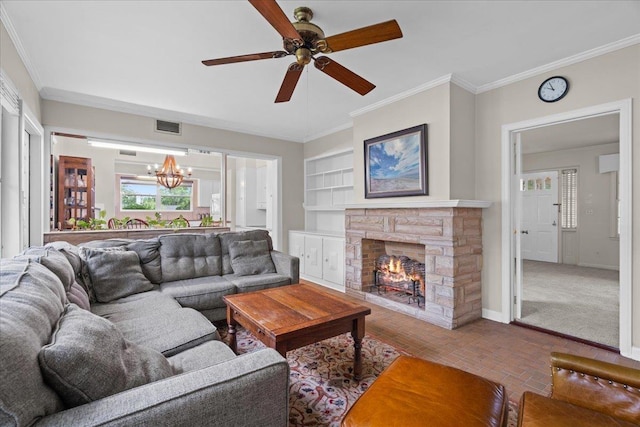 921 Forest Dr, Quincy, FL 32351 - living room with a chandelier, ceiling fan, a stone fireplace, brick patterned flooring, and ornamental molding