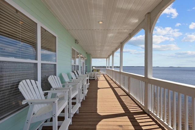 deck featuring a water view