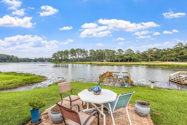 view of patio featuring a water view