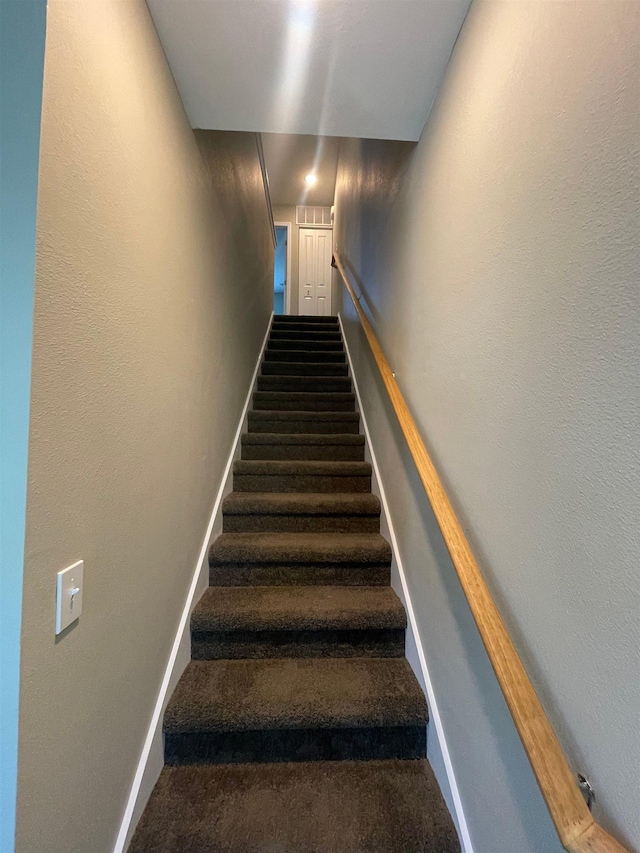 2281 Del Carmel Way, Tallahassee, FL 32303 - staircase featuring baseboards and carpet floors