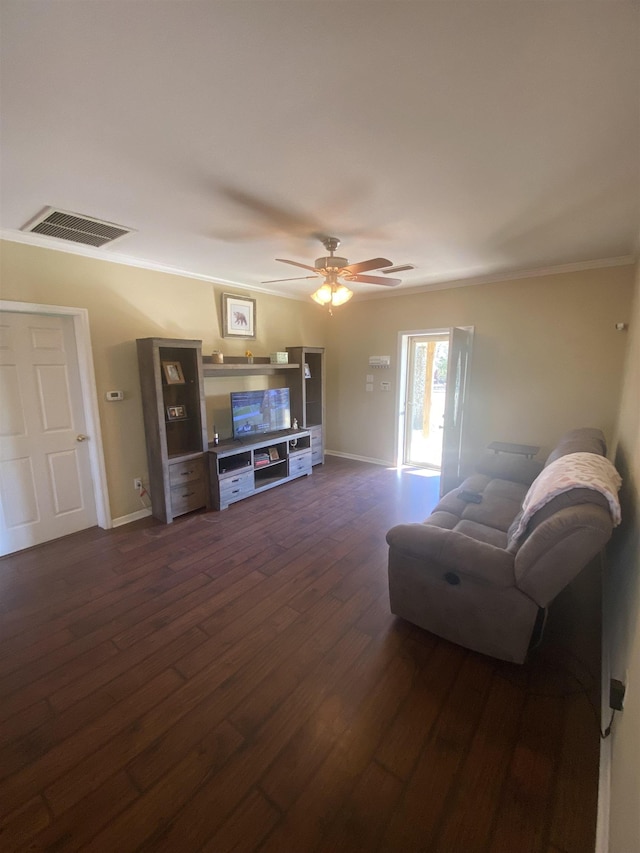 living room featuring ornamental molding, dark hardwood / wood-style floors, and ceiling fan