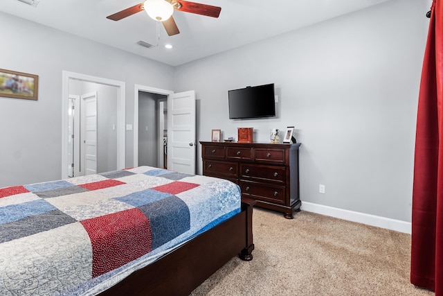 carpeted bedroom with ceiling fan