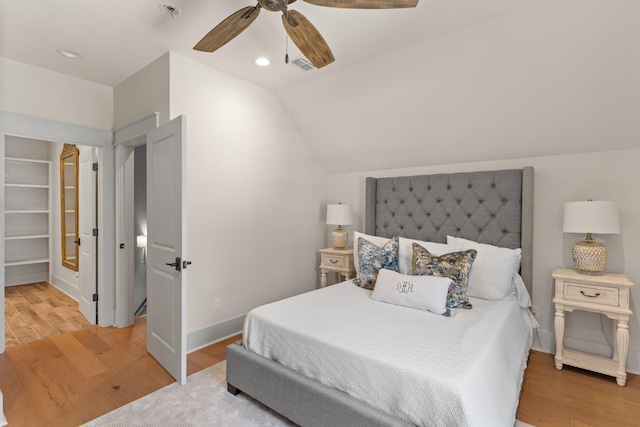 4318 Terebinth Trl, Tallahassee, FL 32317 - bedroom with light wood-type flooring, vaulted ceiling, a ceiling fan, recessed lighting, and baseboards
