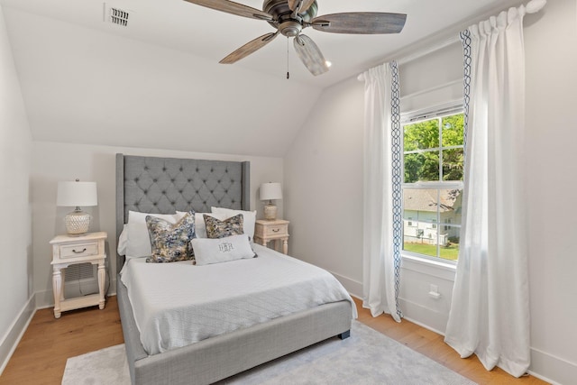 4318 Terebinth Trl, Tallahassee, FL 32317 - bedroom with wood finished floors, lofted ceiling, baseboards, and ceiling fan