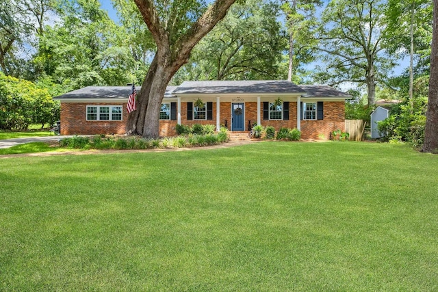 2809 Trebark Dr, Tallahassee, FL 32312 - ranch-style home featuring a front lawn and brick siding