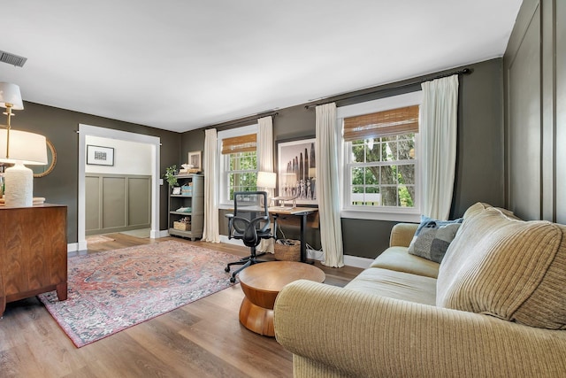 2809 Trebark Dr, Tallahassee, FL 32312 - living area with wood finished floors and a desk