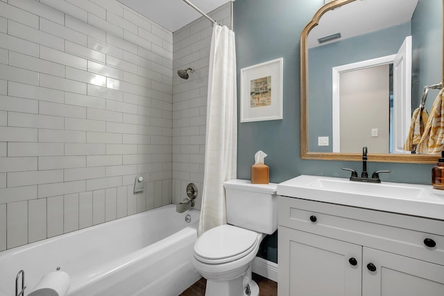 2809 Trebark Dr, Tallahassee, FL 32312 - bathroom with vanity, shower / bath combo, and wood finished floors