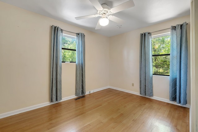 2003 Chuli Nene, Tallahassee, FL 32301 - unfurnished room featuring wood finished floors, baseboards, and a ceiling fan