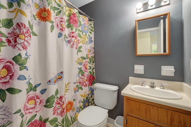 2003 Chuli Nene, Tallahassee, FL 32301 - bathroom with vanity, toilet, and a shower with shower curtain