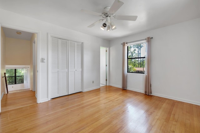 2003 Chuli Nene, Tallahassee, FL 32301 - unfurnished bedroom featuring light wood-style flooring, baseboards, a ceiling fan, and a closet