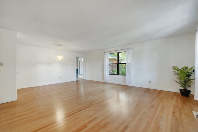 2003 Chuli Nene, Tallahassee, FL 32301 - unfurnished room with light wood-style floors and baseboards