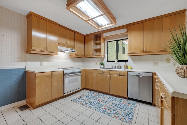 2003 Chuli Nene, Tallahassee, FL 32301 - kitchen featuring stainless steel dishwasher, electric stove, wallpapered walls, a sink, and under cabinet range hood