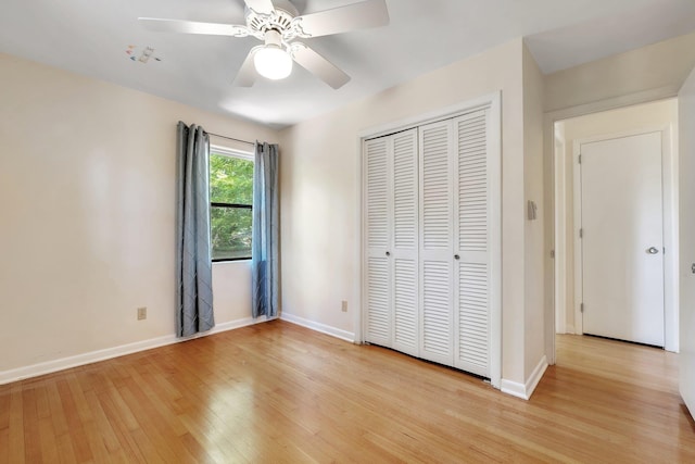 2003 Chuli Nene, Tallahassee, FL 32301 - unfurnished bedroom featuring light wood-type flooring, a closet, baseboards, and a ceiling fan