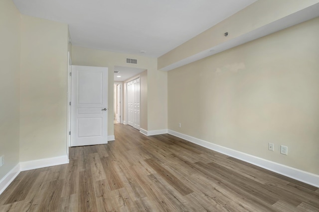 300 S Duval St Unit 612, Tallahassee, FL 32301 - empty room featuring wood finished floors and baseboards