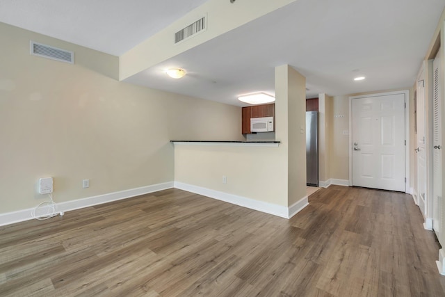 300 S Duval St Unit 612, Tallahassee, FL 32301 - empty room featuring wood finished floors and baseboards