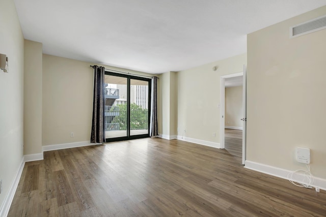 300 S Duval St Unit 612, Tallahassee, FL 32301 - spare room with wood finished floors and baseboards