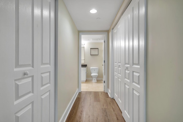 300 S Duval St Unit 612, Tallahassee, FL 32301 - corridor with wood finished floors and baseboards